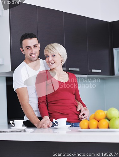 Image of young couple have fun in modern kitchen