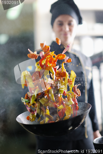 Image of chef preparing meal