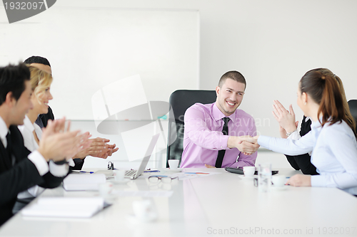 Image of Group of young business people at meeting