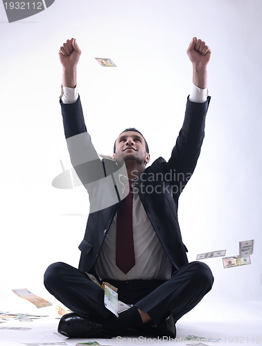 Image of Business man holding money