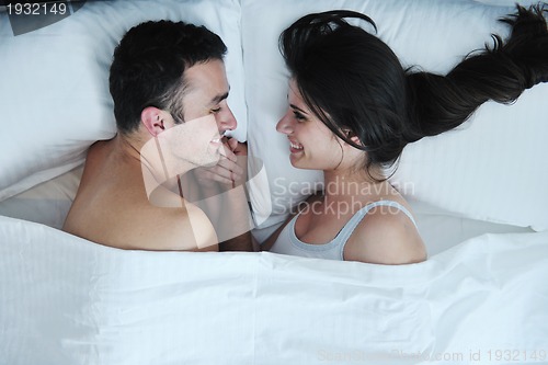 Image of young couple have good time in their bedroom