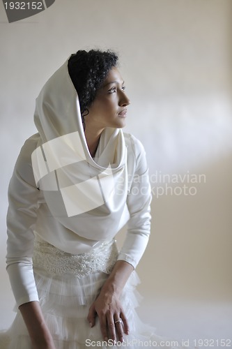 Image of Portrait of a beautiful woman dressed as a bride