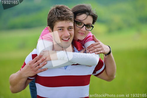 Image of romantic young couple in love together outdoor