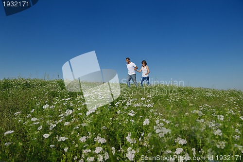 Image of happy couple in wheat field