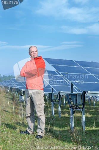 Image of Male solar panel engineer at work place