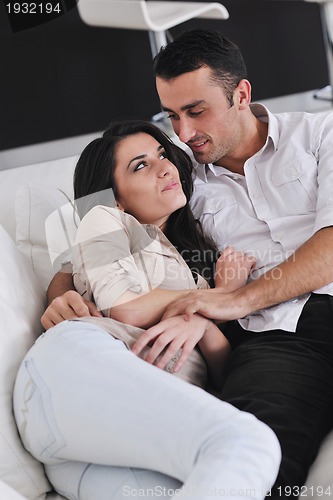 Image of happy young couple relax at home