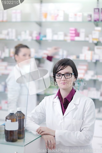 Image of team of pharmacist chemist woman  in pharmacy drugstore