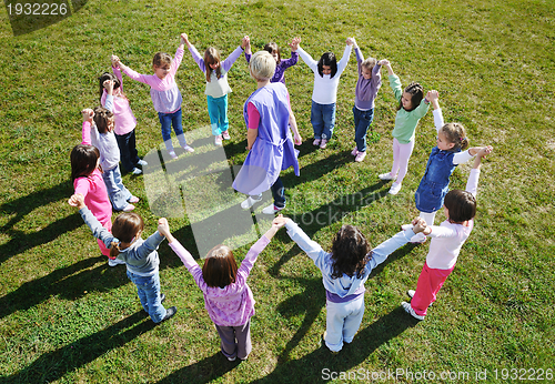 Image of preschool  kids outdoor have fun