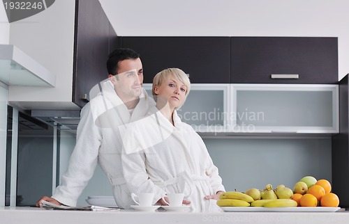 Image of young couple have fun in modern kitchen