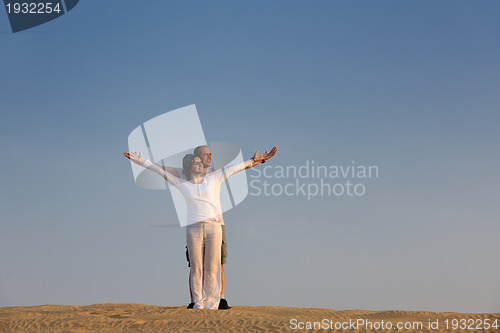 Image of couple enjoying the sunset