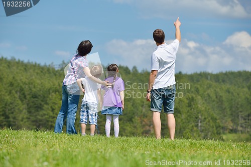 Image of happy young family have fun outdoors
