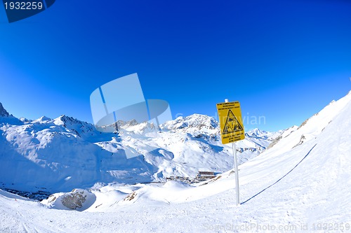 Image of Sign board at High mountains under snow in the winter