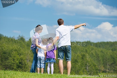 Image of happy young family have fun outdoors