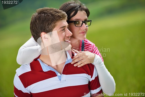 Image of romantic young couple in love together outdoor