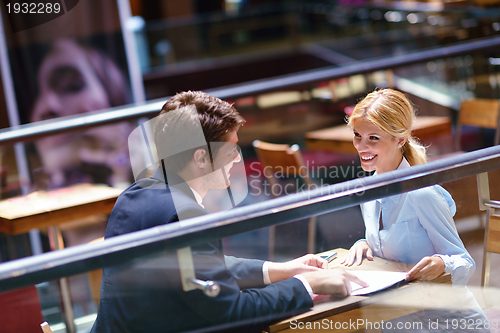 Image of business people in a meeting at office