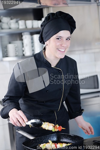 Image of chef preparing meal