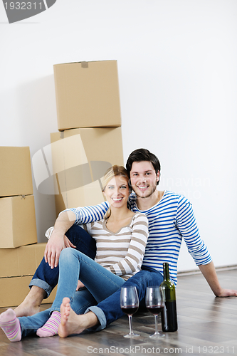 Image of Young couple moving in new house