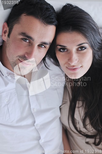 Image of happy young couple relax at home