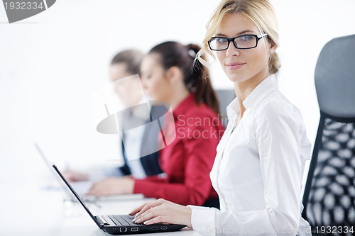 Image of business woman group with headphones