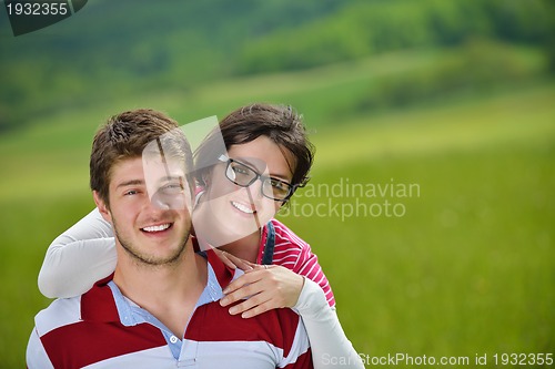 Image of romantic young couple in love together outdoor