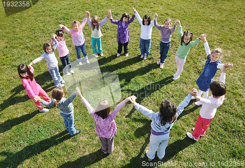 Image of preschool  kids outdoor have fun