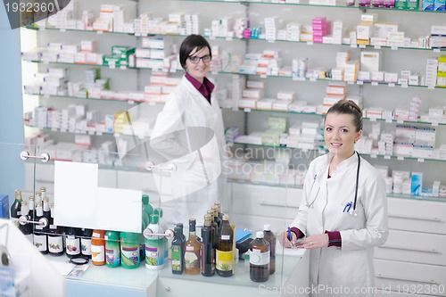 Image of team of pharmacist chemist woman  in pharmacy drugstore