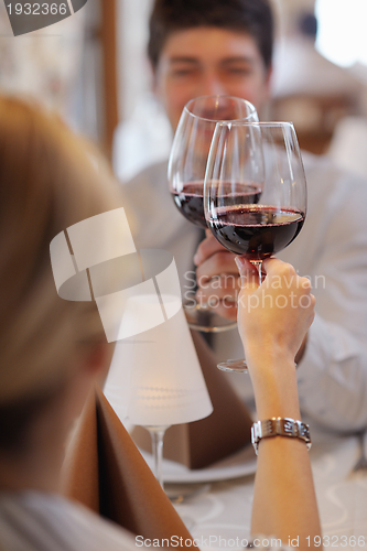 Image of young couple having dinner at a restaurant