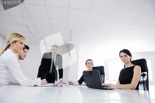 Image of business people in a meeting at office
