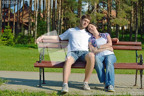 Image of romantic young couple in love together outdoor