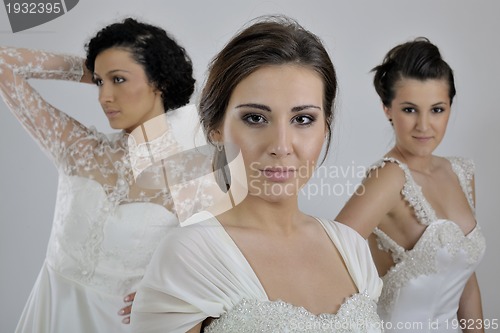 Image of portrait of a three beautiful woman in wedding dress