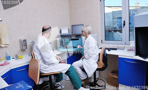Image of veterinarian and assistant in a small animal clinic