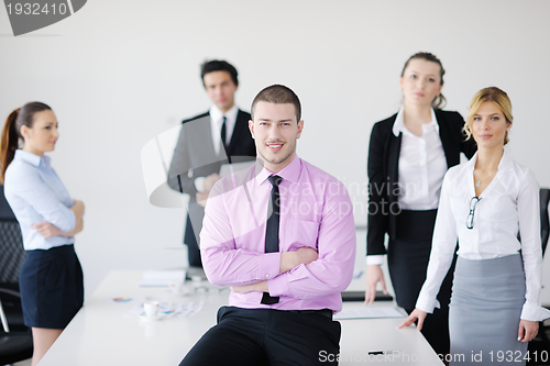 Image of young business man at meeting