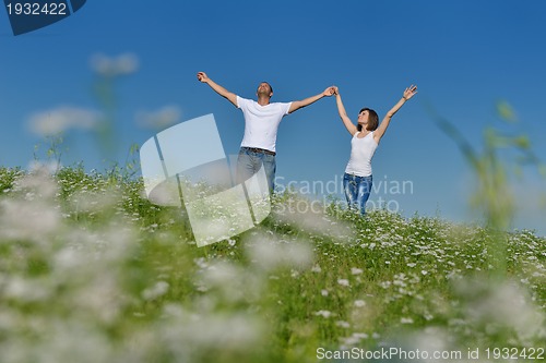 Image of happy couple in wheat field