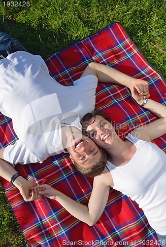 Image of romantic young couple in love together outdoor