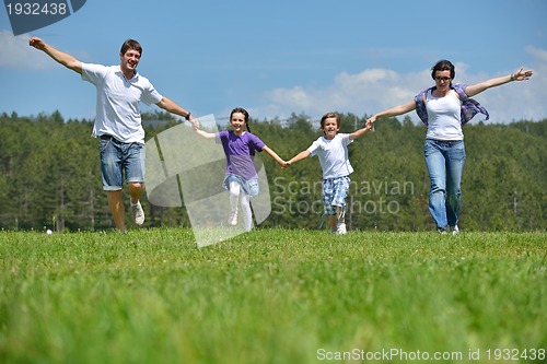 Image of happy young family have fun outdoors