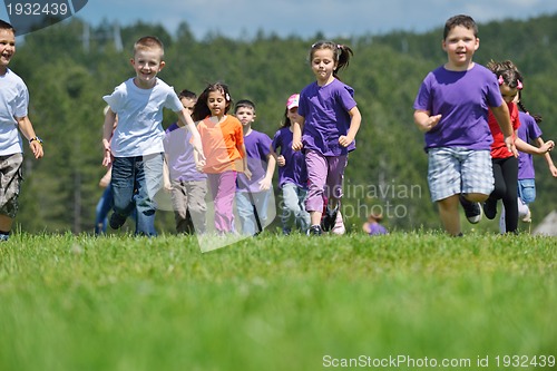Image of happy kids group  have fun in nature
