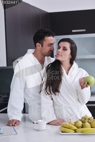Image of young couple have fun in modern kitchen