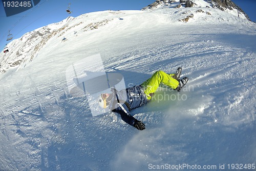 Image of skiing on fresh snow at winter season at beautiful sunny day