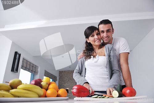 Image of young couple have fun in modern kitchen