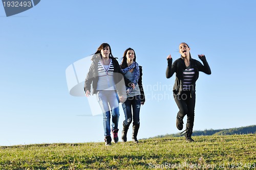 Image of group of teens have fun outdoor