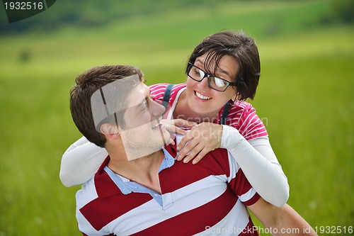 Image of romantic young couple in love together outdoor