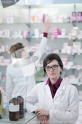 Image of team of pharmacist chemist woman  in pharmacy drugstore