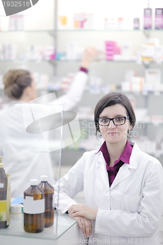 Image of team of pharmacist chemist woman  in pharmacy drugstore