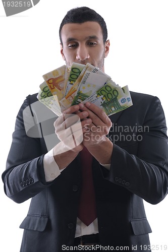 Image of Business man holding money