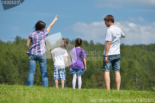 Image of happy young family have fun outdoors