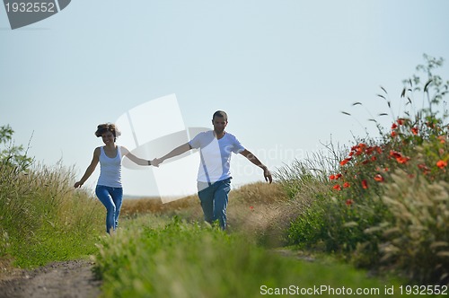 Image of happy couple in wheat field