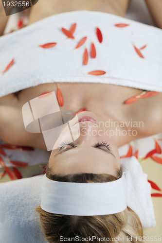 Image of Beautiful young woman in spa