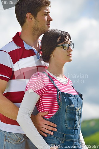 Image of romantic young couple in love together outdoor