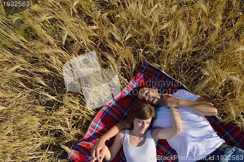Image of happy couple in wheat field