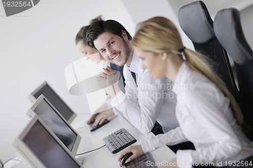 Image of business people group working in customer and help desk office